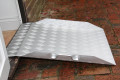 aluminium threshold ramp in use for a front door