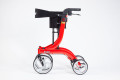 Side view of the red rollator 