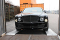 Luxury car loading in to container 