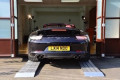Car ramps loading in to showroom 