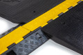 DDA ramp resting on cable protector 