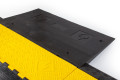 Half of DDA ramp resting on cable protector 