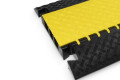 Black and yellow heavy duty cable protector