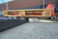 Pallet truck going over bridge ramp 