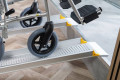 Telescopic Wheelchair ramps resting on step 