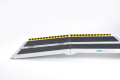 Multifold ramp on a white background with hazard tape