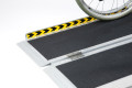 Hinge on the multifold ramp and safety edges 