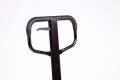 Black handle of the hand operated pallet truck