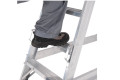 Man walking up aluminium warehouse ladder in safety boots 