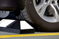 Black and white wheel stop 