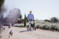 Man walking using rollator 