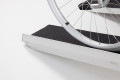 Manual wheelchair going up ramp 