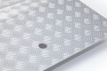 Finger grip hole on folding driving ramp 