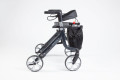 Black rollator with seat, backrest and handles 