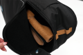 close up of zip open bag with rollator handle showing