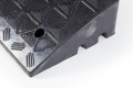Close up of channels on rubber kerb ramp 