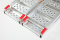 Aluminium motorcycle ramps rest on connection 