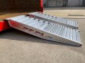 side view of Aluminium container ramps rest on container 