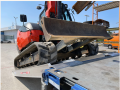 Plant machinery driving up alloy ramps 