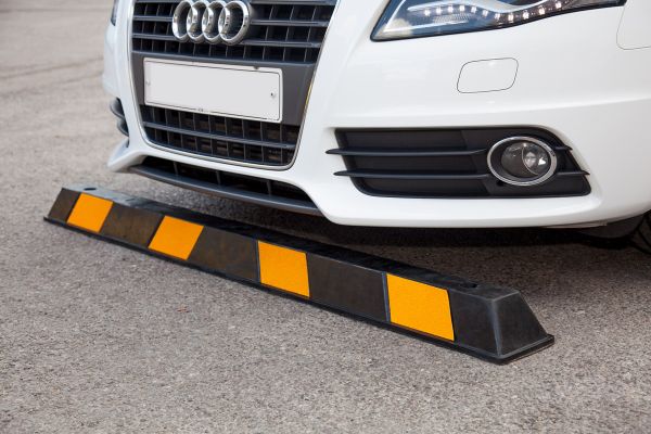Black and yellow wheel stop 