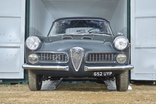 Classic car on loading ramps 