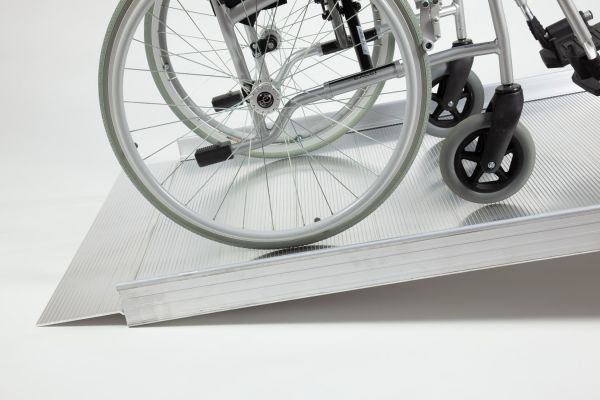 Wheelchair on wheelchair ramp