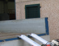 Aluminium channel ramps resting on tipper truck 