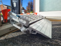 rest on connection of rollable ramp