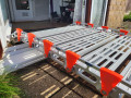 side profile of rollable ramp security clips going over pvc front door