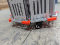 Close up of the rollAble ramp rolled up and standing on it's side on the wheels 
