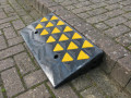 Rubber kerb ramp next to the kerb 