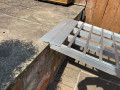 Motorcycle ramp resting on step 