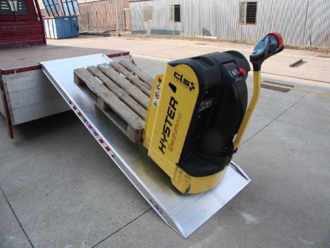 Pallet truck on viper aluminium loading ramp 