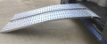 side profile of ramps in use on a van