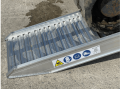 foot of ramps resting on ground 
