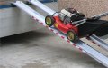 Loading lawnmower on aluminium channel ramps 