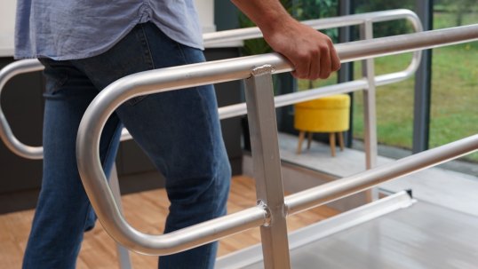 handrails in use with pedestrian