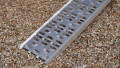 Angled foot for the motorbike loading ramp 