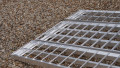 Close up of the foot end of the extra wide motorcycle loading ramp kit