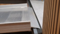 Close up of rest on connection for wheelchair ramp with handrails 