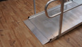 vertical view of handrails and base of ramp