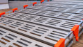 Close up of surface on a step of a portable rollable aluminium wheelchair ramp