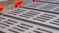 Close up of the surface of a portable rollable aluminium wheelchair ramp