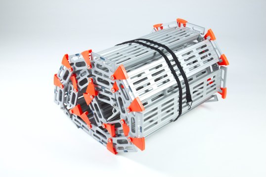 Rolled wheelchair ramp stored 