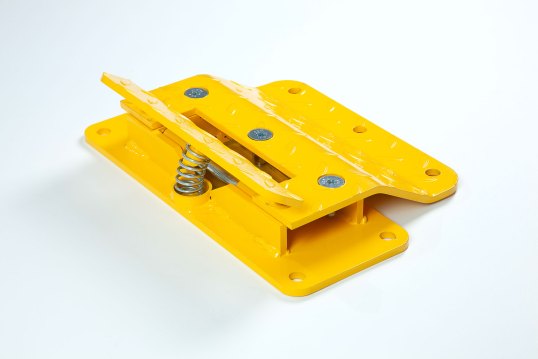 Yellow flow plate with spring to prevent traffic passing over 
