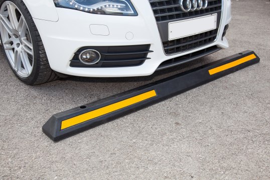 Black and yellow wheel stop 