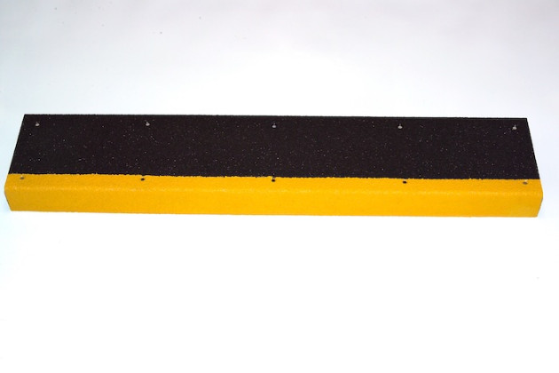 Black and yellow stair tread with nosing 