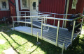 Person assembling modular wheelchair ramp 