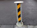 Telescopic bollard on driveway 
