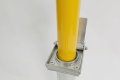 close up of yellow bollard